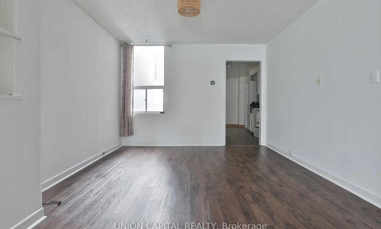 Att/Row/Twnhouse living room at 108 Sumach St Toronto