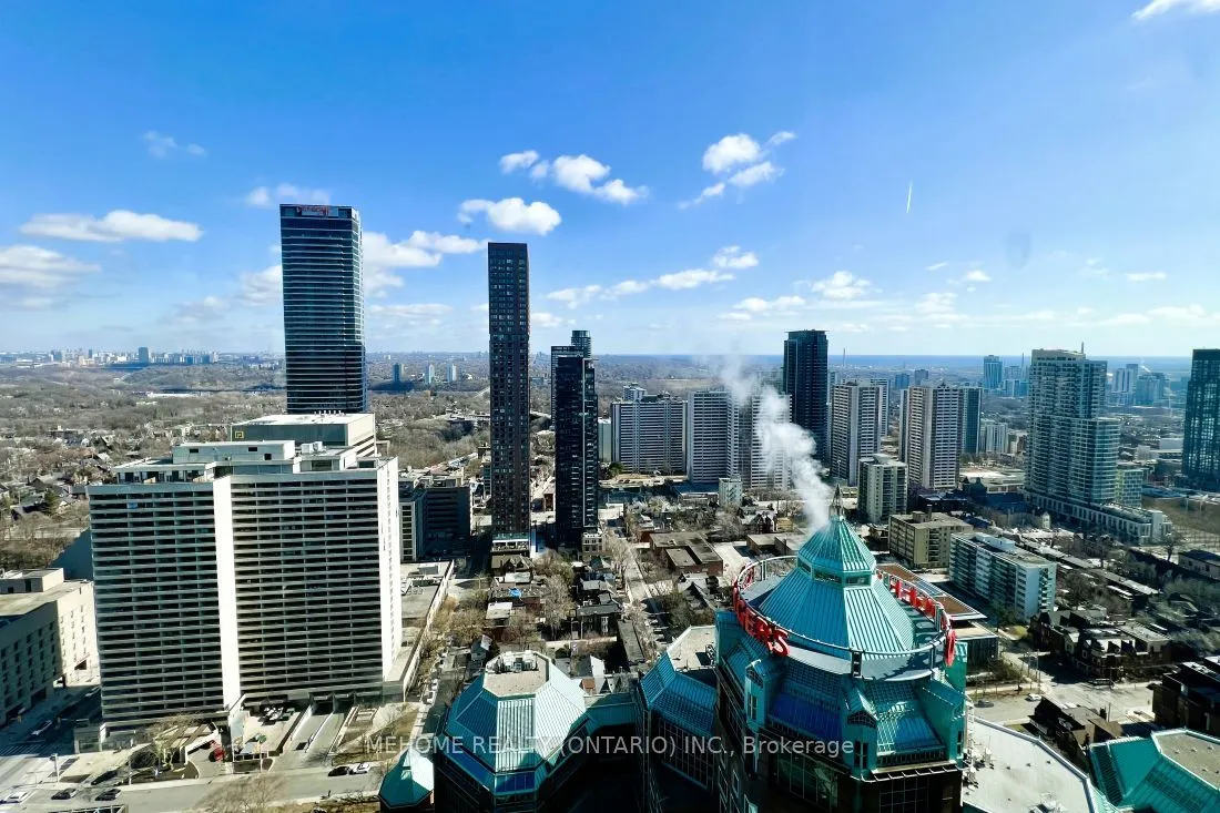 Condo Apt living room at 110 Charles St Toronto