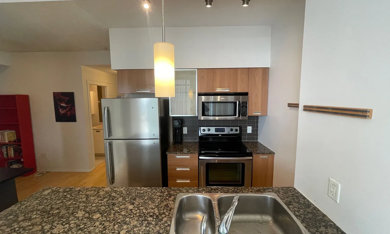 Condo Apt kitchen at 37 Grosvenor St Toronto