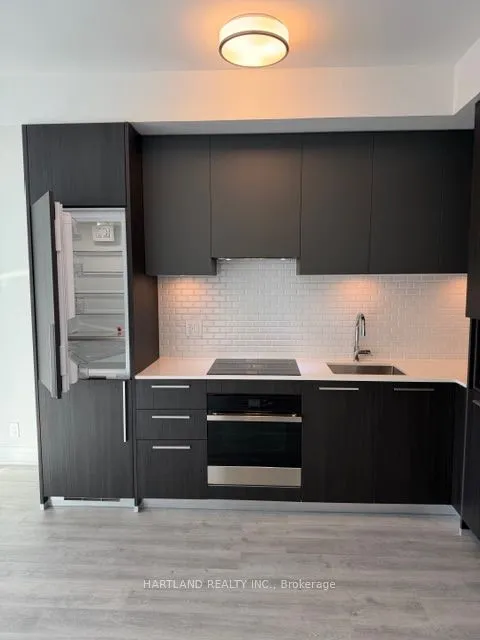 Condo Apartment living room at 65 Broadway Avenue Toronto