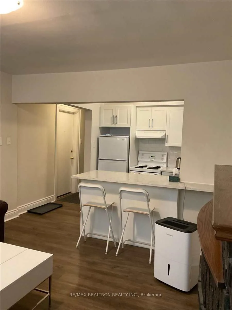 Multiplex kitchen at 2477 Queen Street Toronto