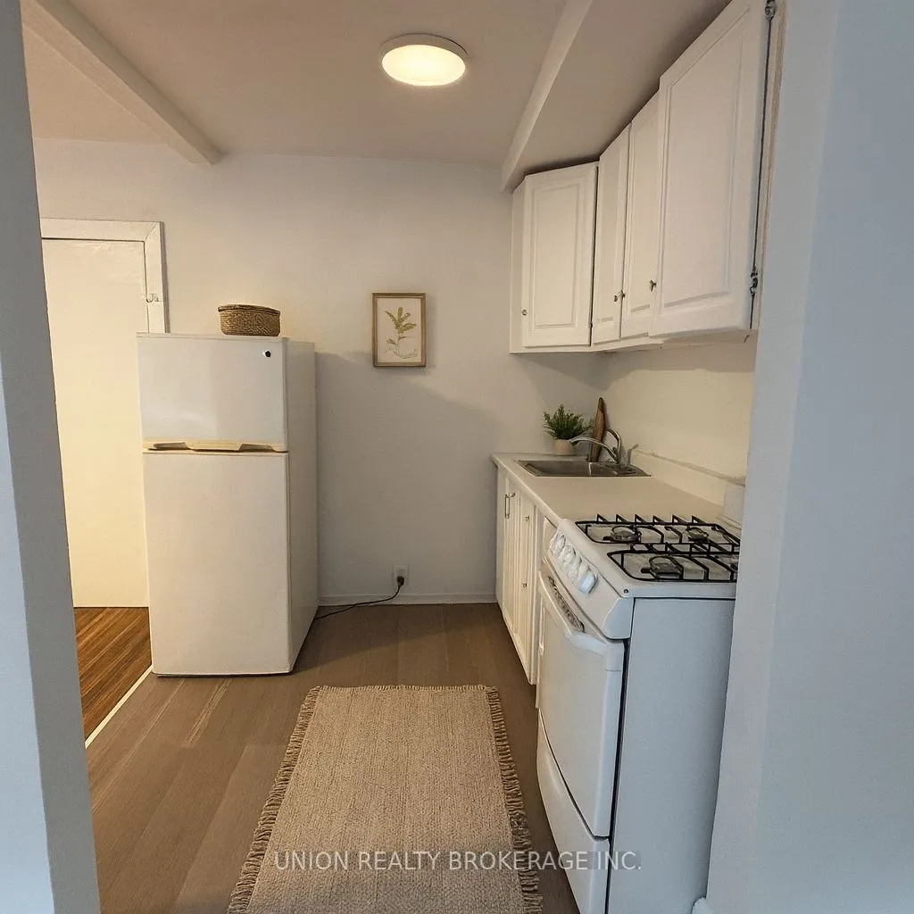 Multiplex living room at 2449 Queen Street Toronto