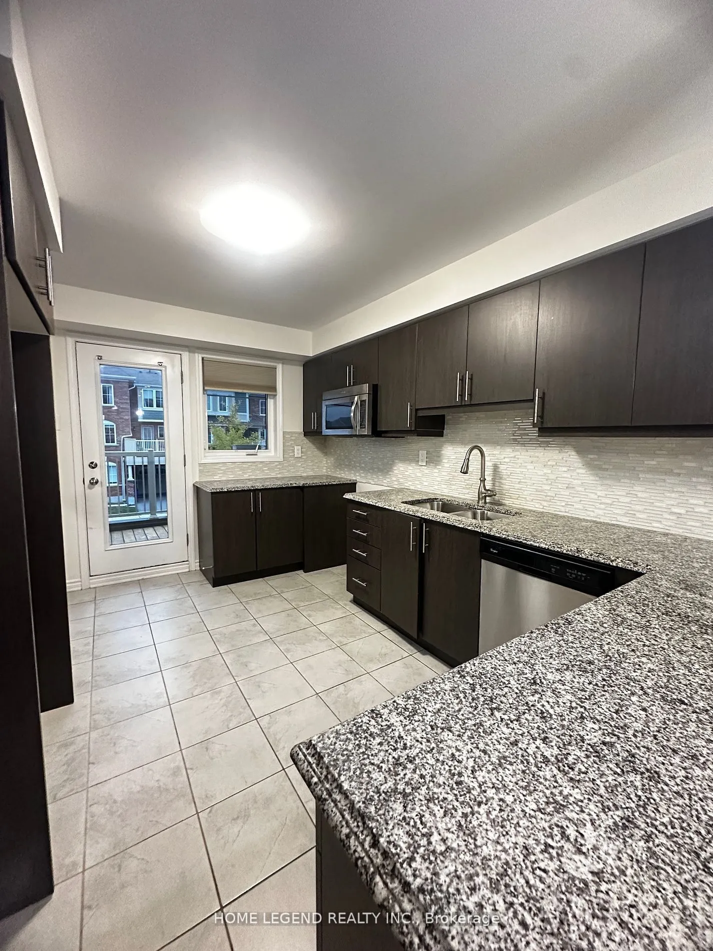Att/Row/Townhouse kitchen at 180 Thomas Phillips Drive Aurora
