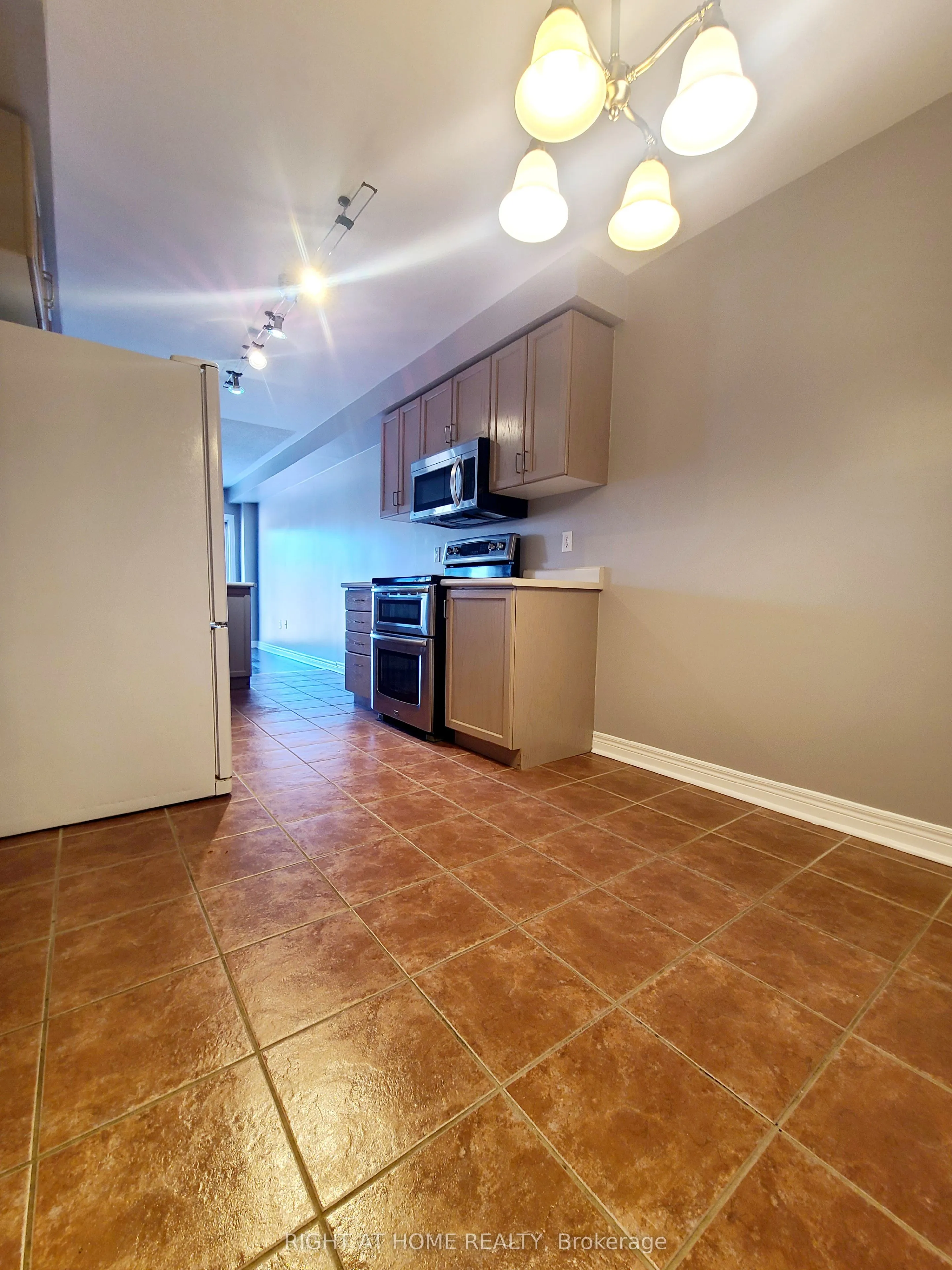 Att/Row/Townhouse living room at 99 Snedden Avenue Aurora