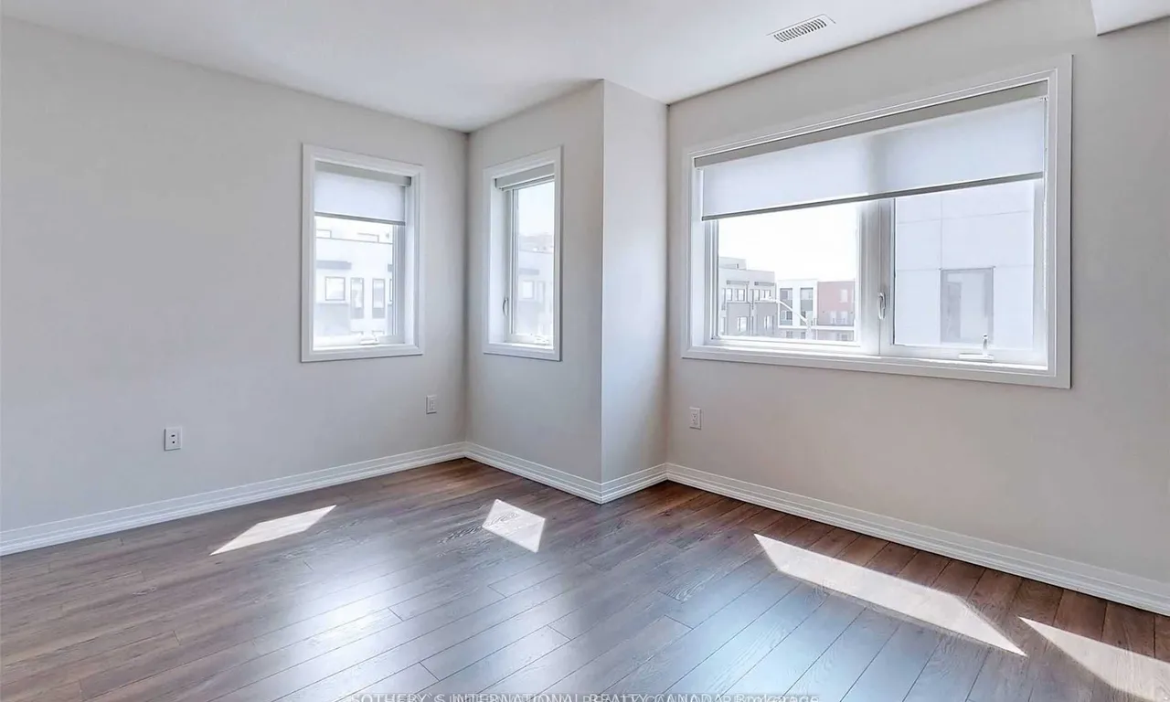 Att/Row/Twnhouse interior view at 1 Thomas Mulholland Dr Toronto