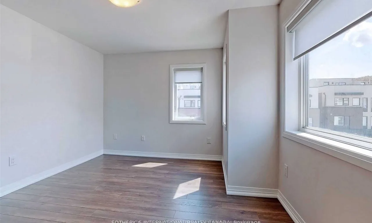 Att/Row/Twnhouse living room at 1 Thomas Mulholland Dr Toronto