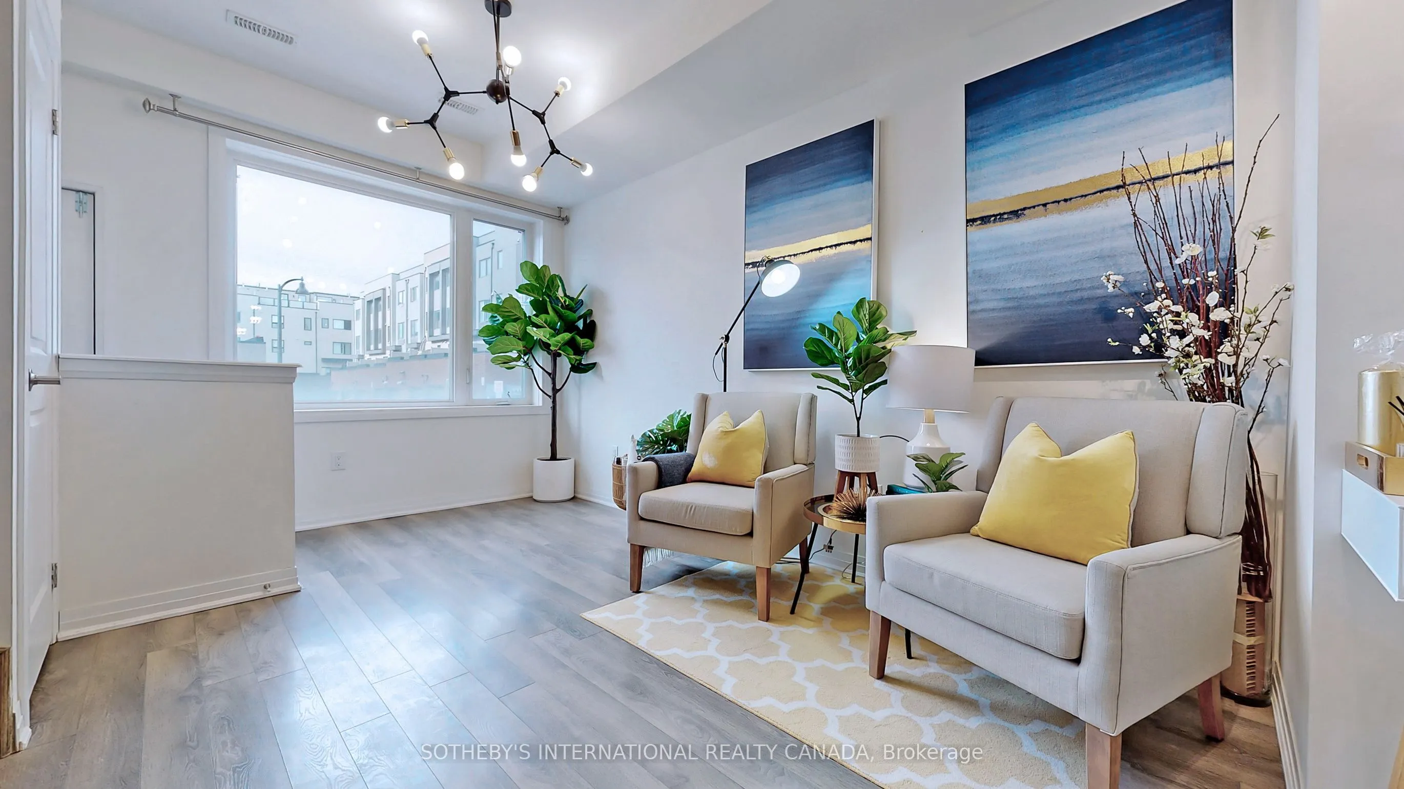 Att/Row/Townhouse living room at 27 Thomas Mulholland Drive Toronto