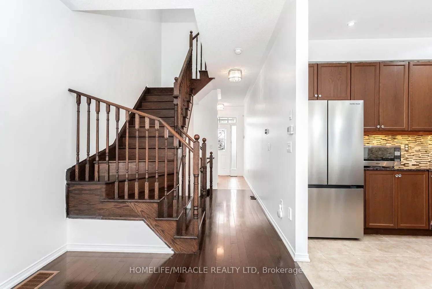 Att/Row/Townhouse living room at 745 Farmstead Drive Milton